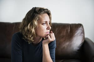 a woman experiences the dangers of alcohol withdrawal